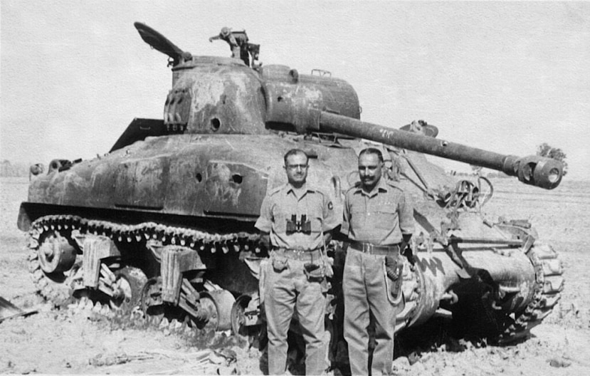 This picture is of my maternal grandfather Brig. Hari Singh Deora A.V.S.M (Ati Vishisht Sewa Medal), 18th Cavalry (Indian Army). This picture was taken after Indian Army destroyed over 100 Patton and Sherman Tanks of Pakistani Army during the 1965 Indo-Pak War. The place was later named as Patton Nagar in Pakistan.