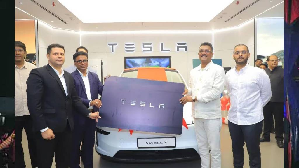 Astad Kale questions Transport Minister Pratap Sarnaik about Tesla cars gift thane news