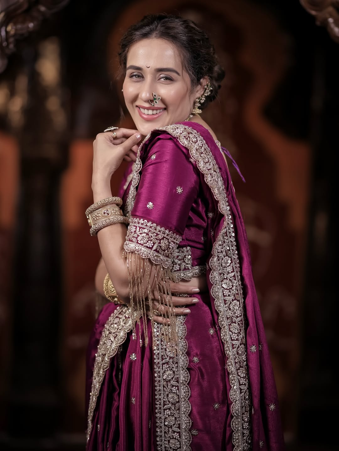 Tejaswini Lonari purpul nauvari saree