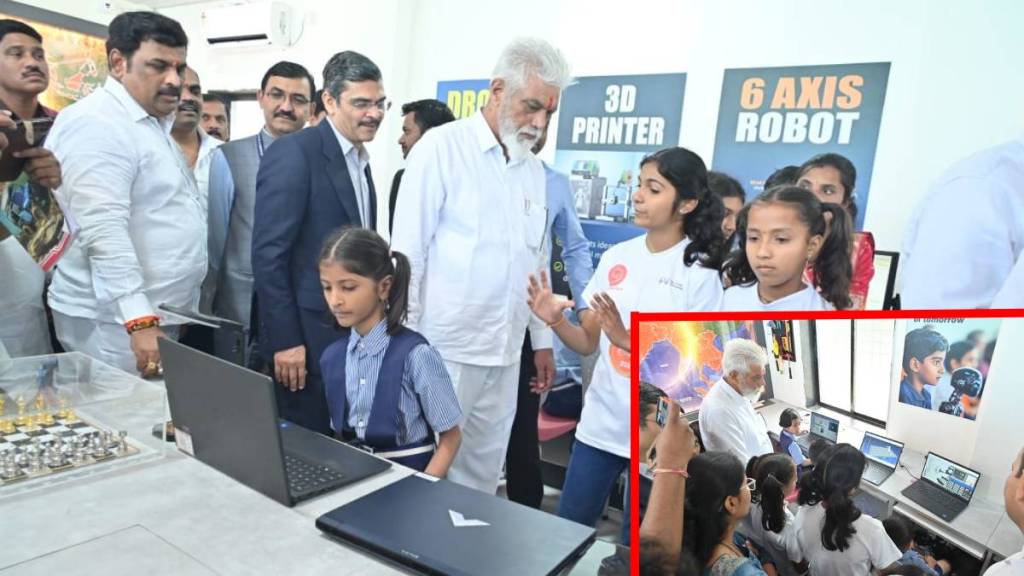 Education Minister Dada Bhuse watching a robotics demonstration by students at the Srujan Laboratory