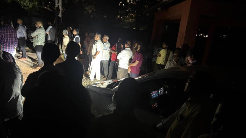 Funeral in the cemetery under the light of car headlights Funeral in the cemetery under the light of car headlights