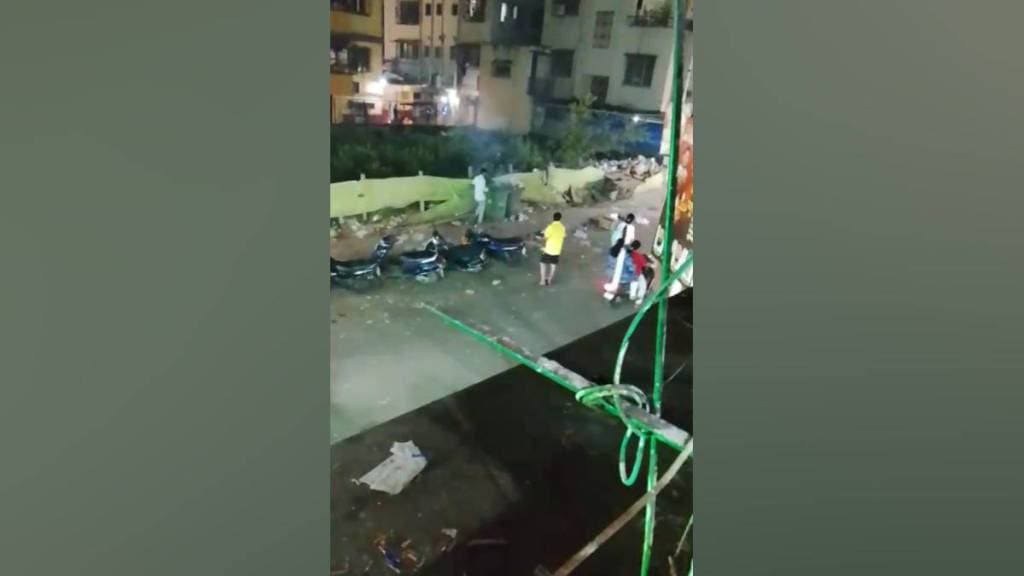 Vasai during diwali celebration youths bursting fire crackers in municipal garbage bin