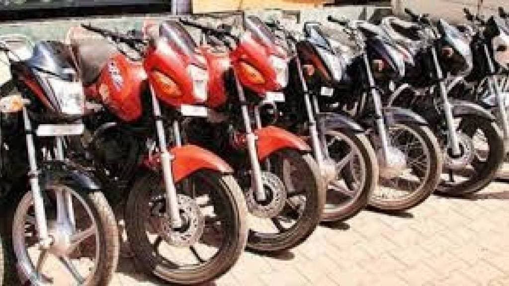 mumbai hundreds of two wheelers for sale parked on Chembur sidewalk