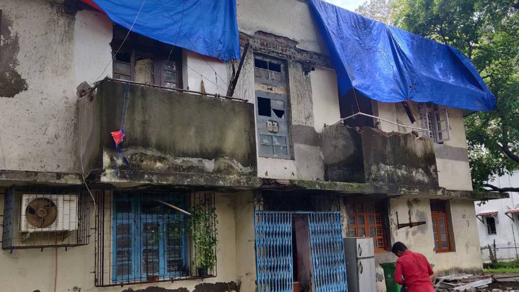 The roof of a building in the Post and Telegraph Colony on Sahar Marg in Andheri collapsed