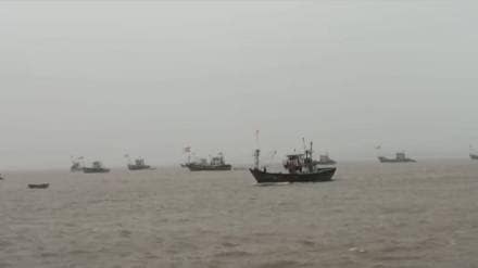 Hundreds of fishing boats have been forced back by a sudden storm Hundreds of fishing boats have been forced back by a sudden storm
