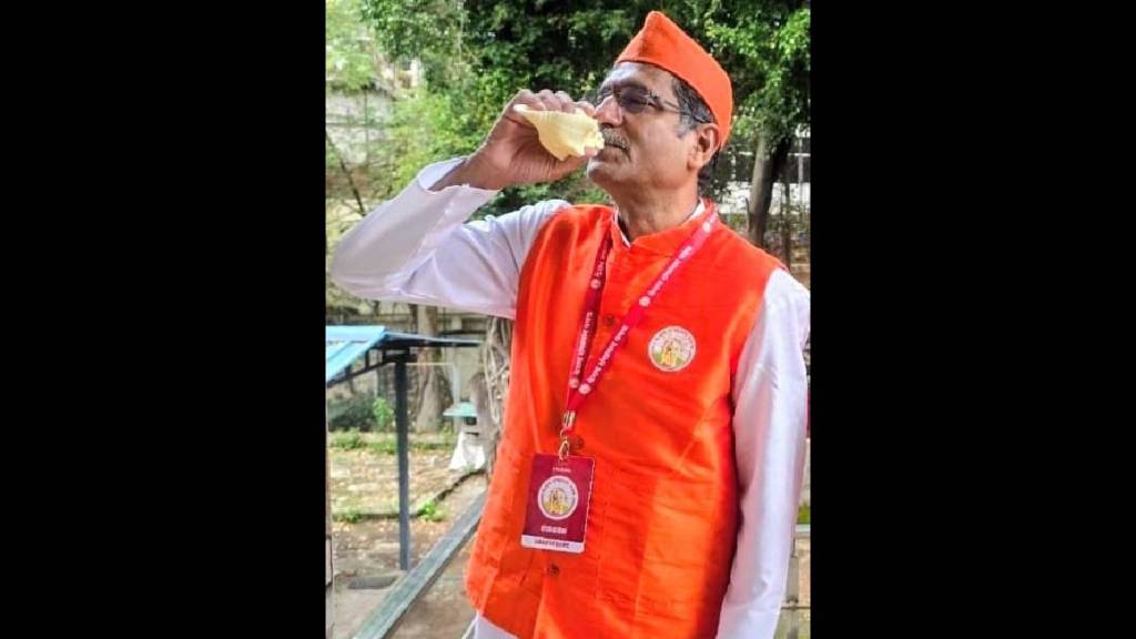 Dr. Akshay Kulkarni playing the conch shell