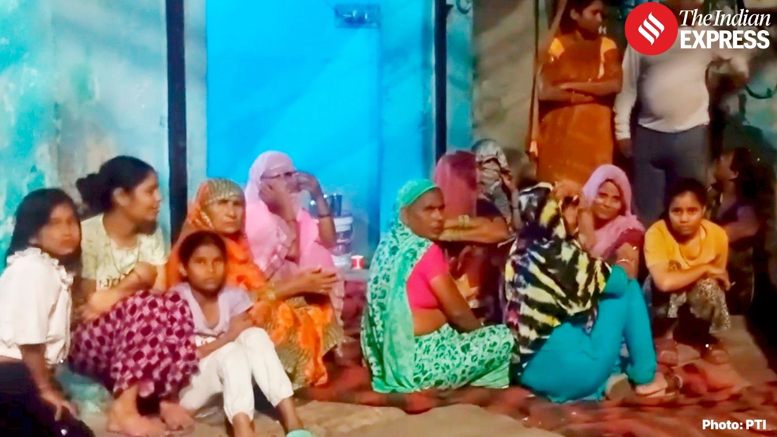 Grieving family members gathered outside the hospital and mortuary
