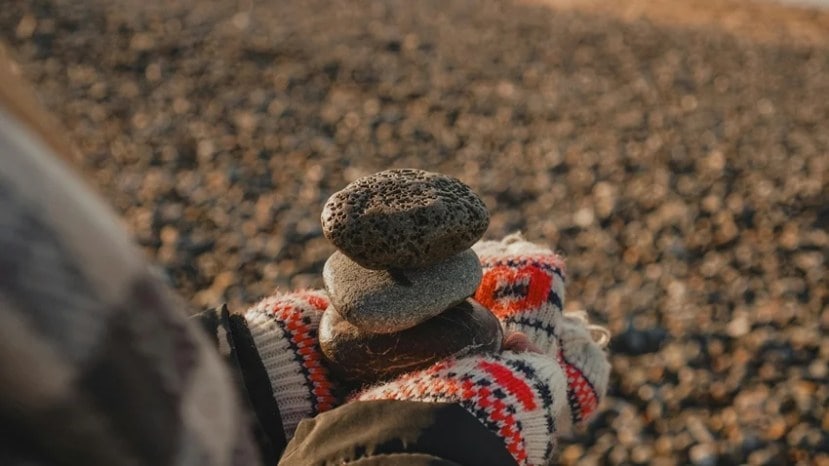 Person visualizing goals with positive energy, symbolizing manifestation.