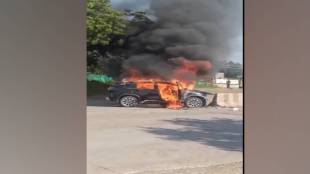 jalgaon speeding car hit highway divider caught fire woman died