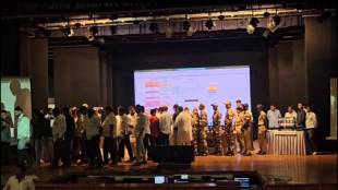 Political party office bearers chant slogans during the Panvel reservation draw