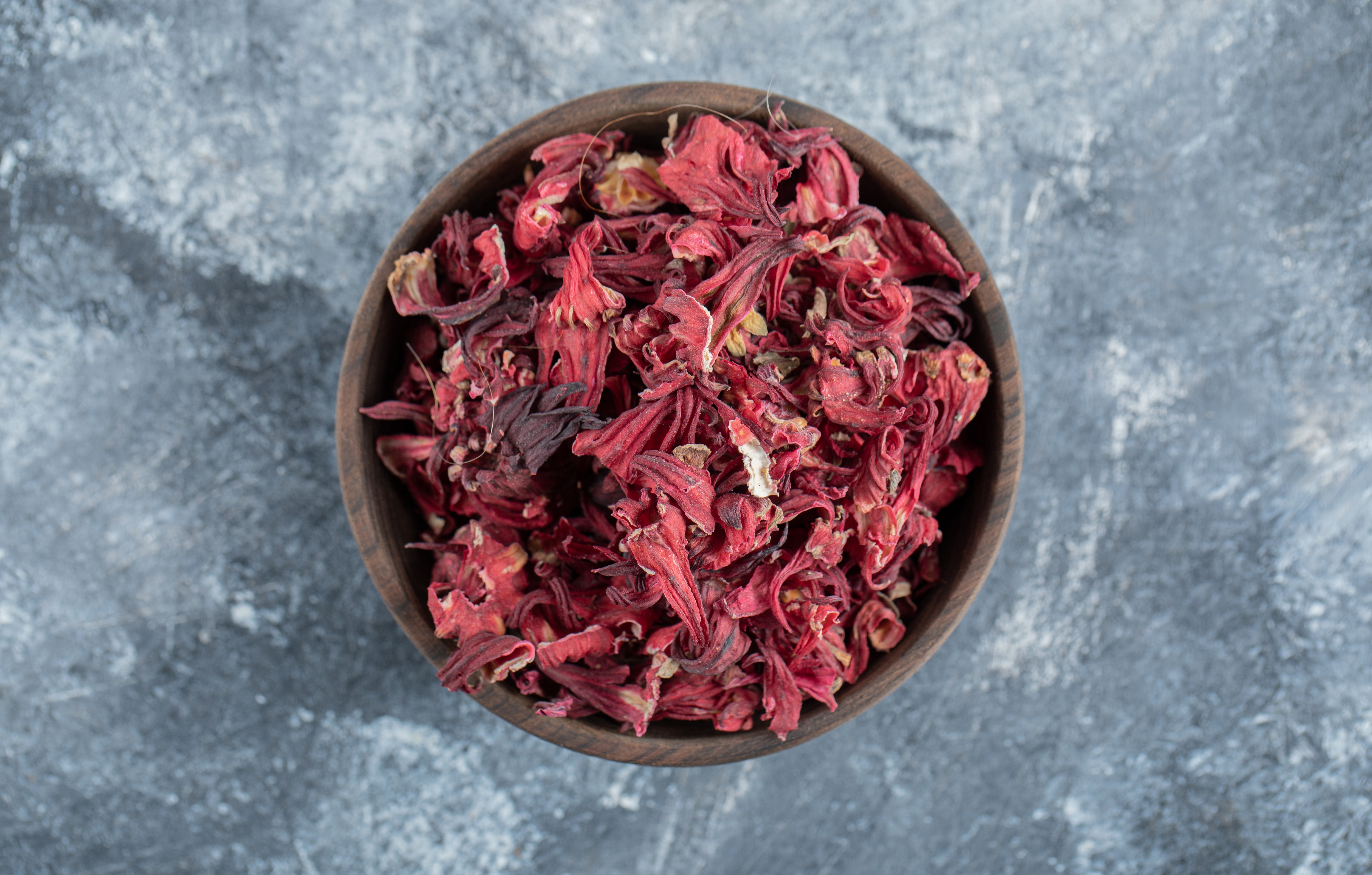 Hibiscus-infused almond oil for strong and shiny hair