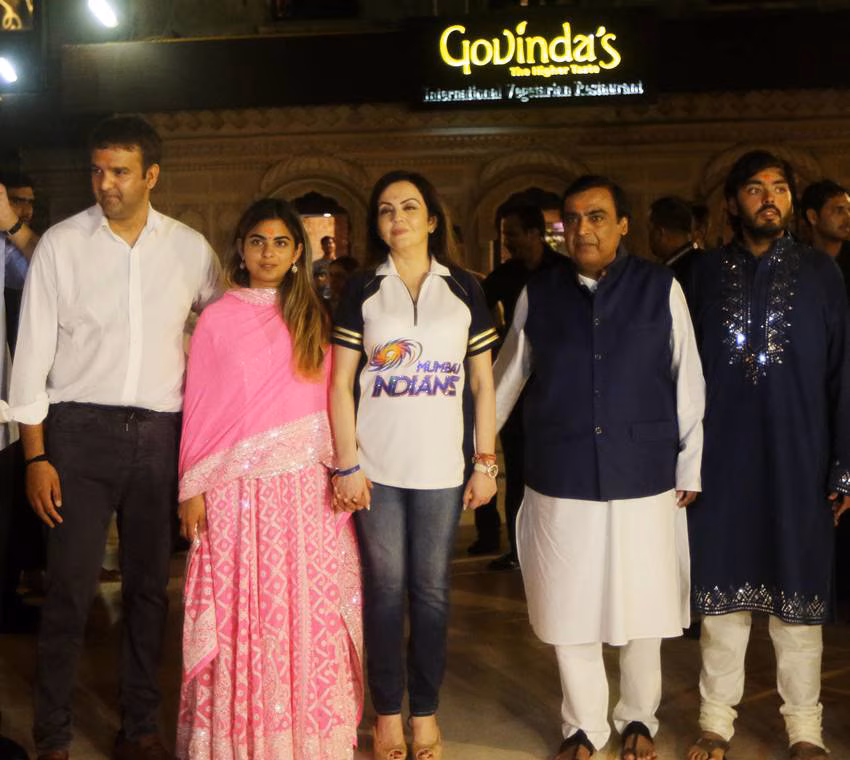 Ambani family drinking Holstein Friesian cow