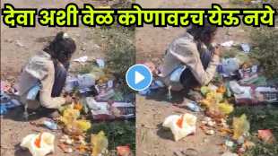 A young girl eating from a garbage heap in Vidisha a painful glimpse into poverty.