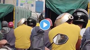 Man rides with a frying pan on his head to dodge traffic fine viral video sparks laughter online!