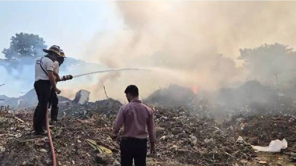 Fire breaks out at Panvel Municipal Corporation garbage dump near Mansarovar railway station in Kamothe Fire breaks out at Panvel Municipal Corporation garbage dump near Mansarovar railway station in Kamothe