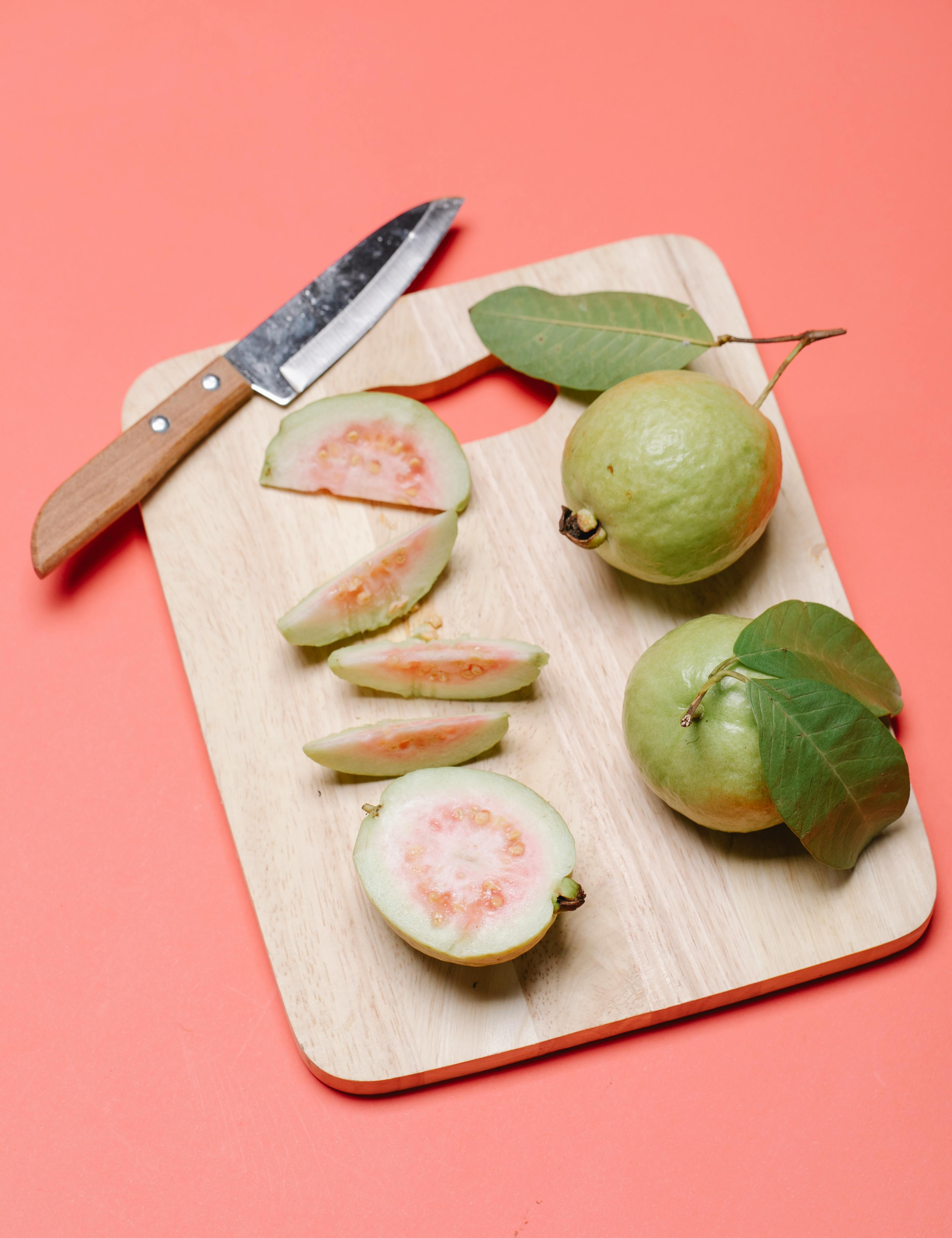 Fresh guava without peel showing natural texture and slices rich in nutrients