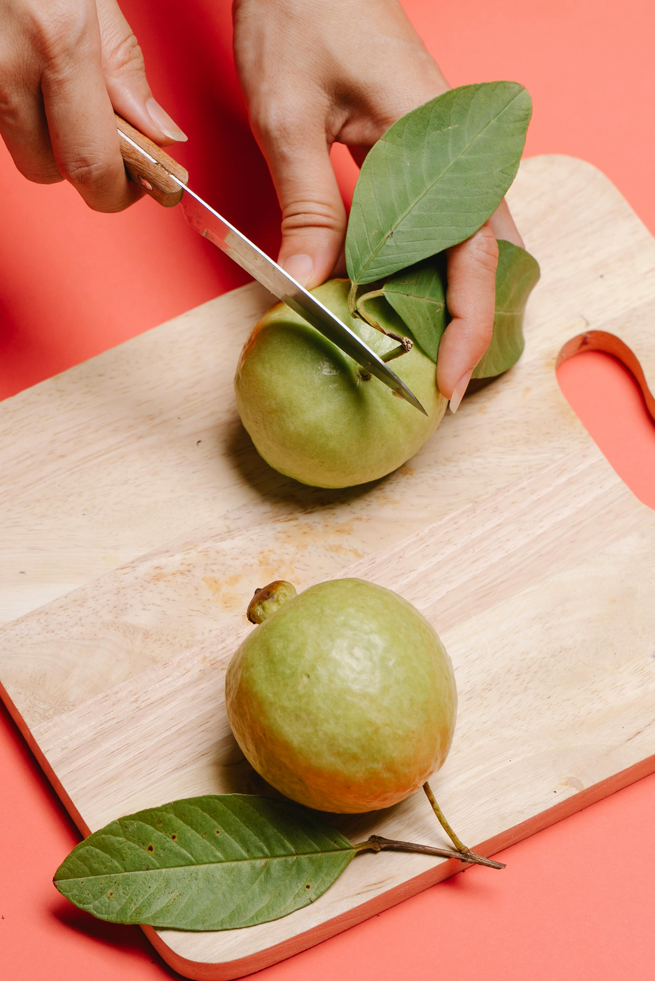 Fresh guava without peel showing natural texture and slices rich in nutrients