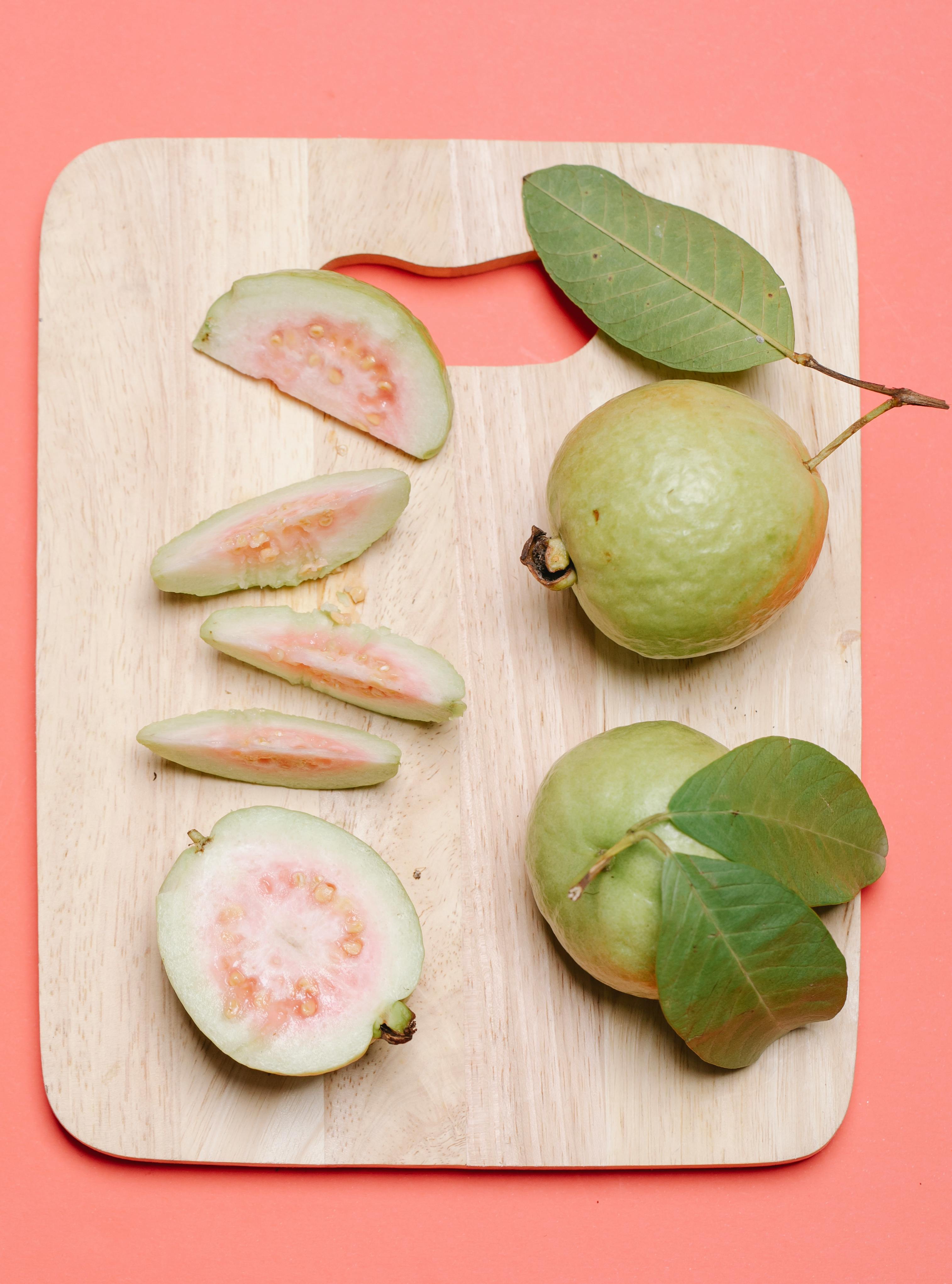 Fresh guava without peel showing natural texture and slices rich in nutrients