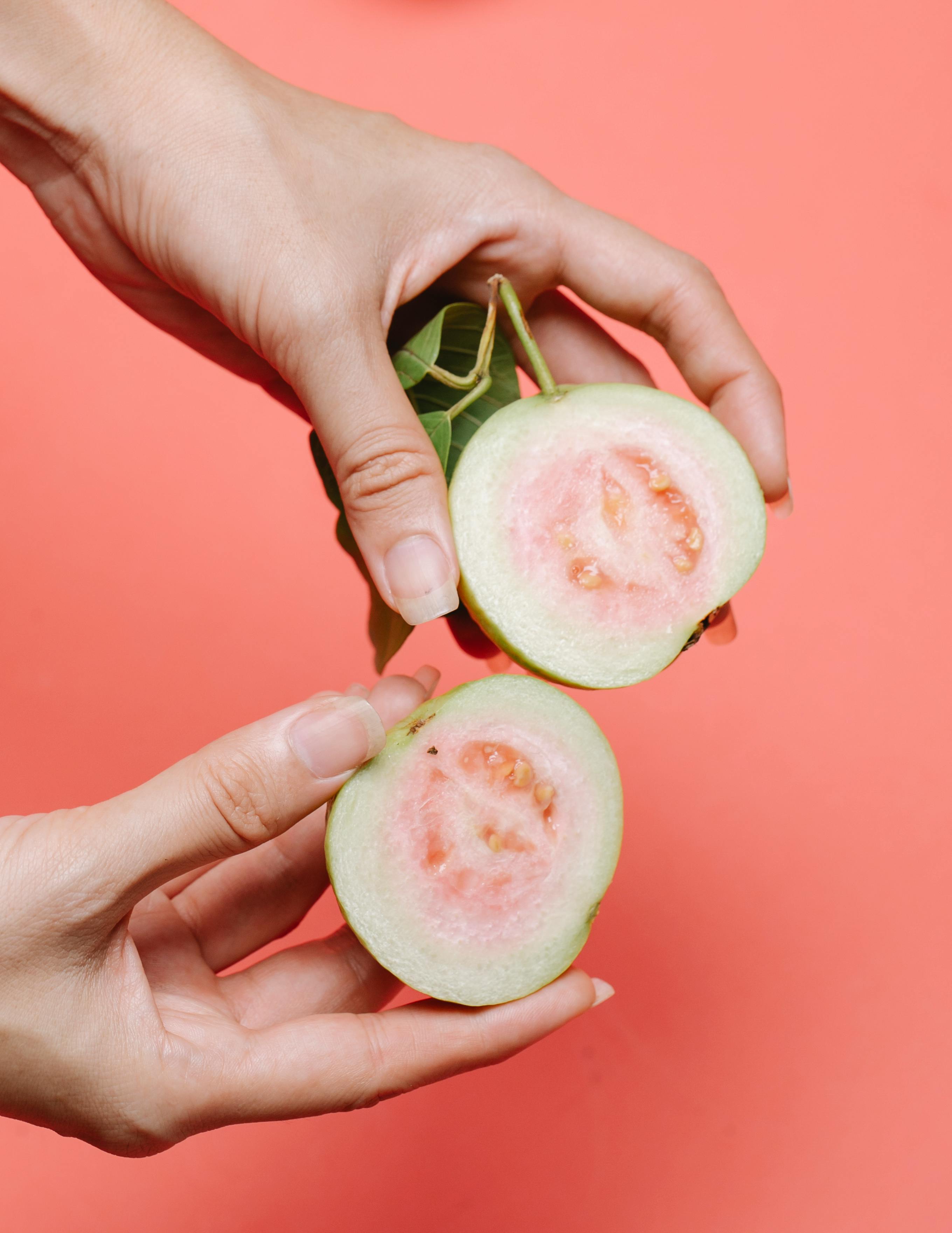 Fresh guava without peel showing natural texture and slices rich in nutrients