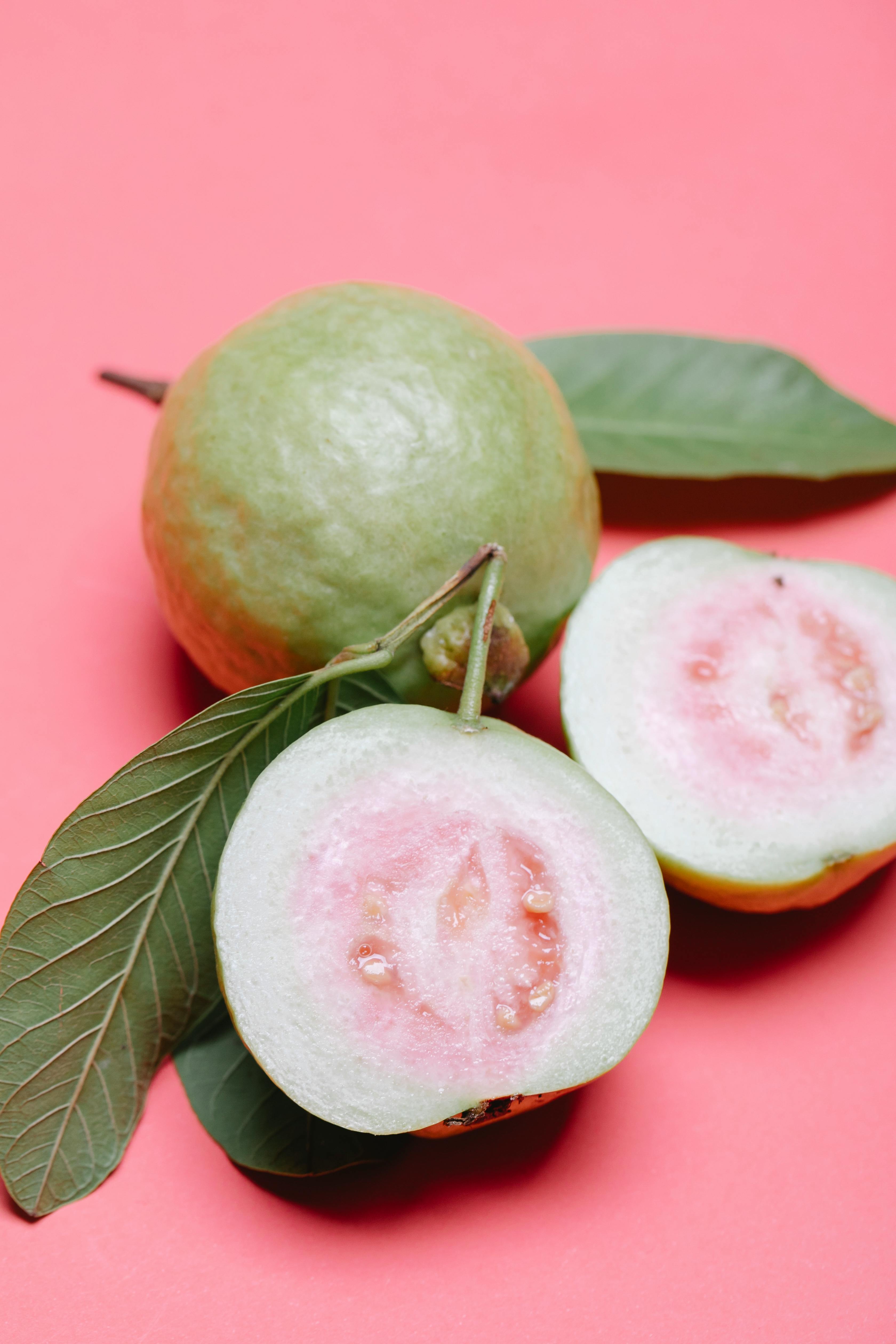 Fresh guava without peel showing natural texture and slices rich in nutrients
