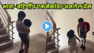 Little brother runs with joy to hug his elder sibling