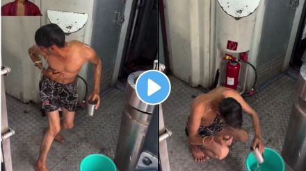 Man bathing with shampoo inside moving train