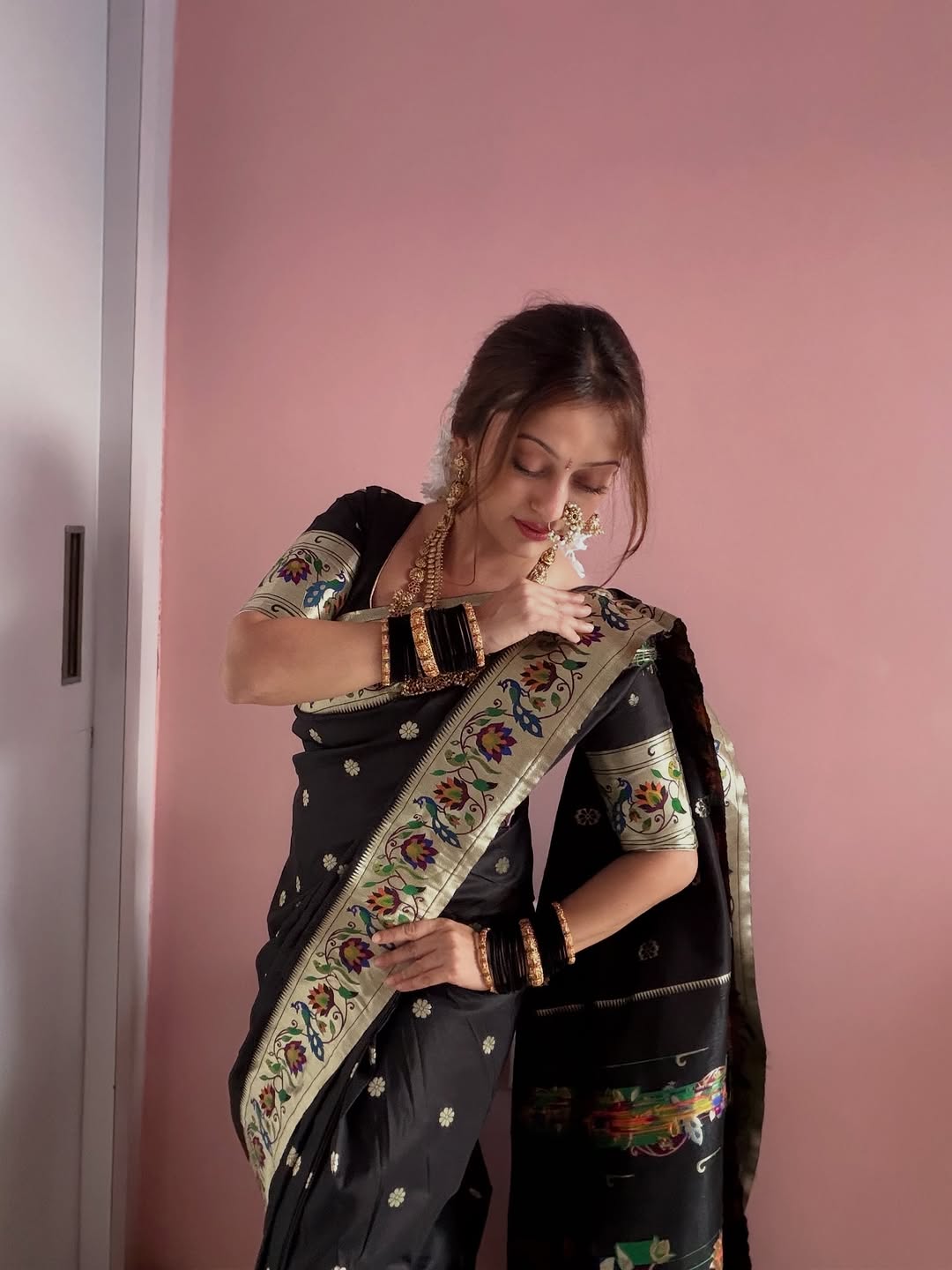 Mansi Naik black Paithani saree makar sankranti look