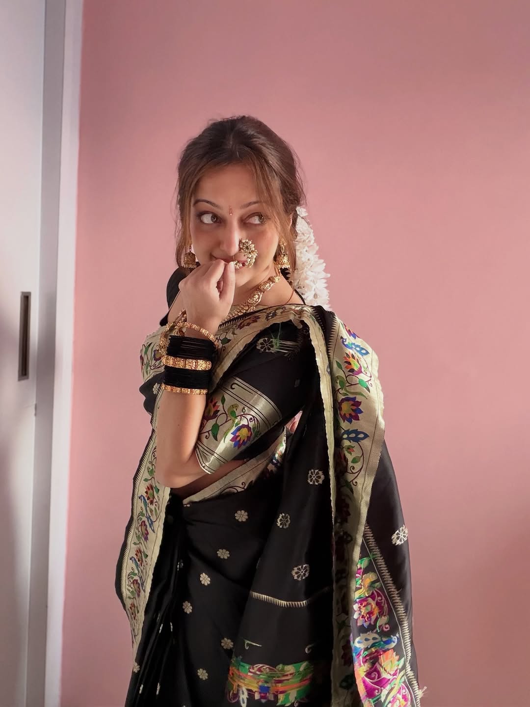 Mansi Naik black Paithani saree makar sankranti look