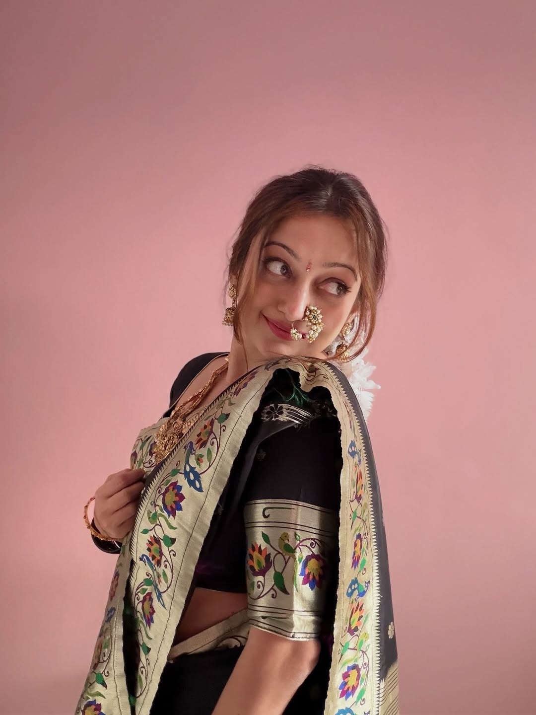 Mansi Naik black Paithani saree makar sankranti look