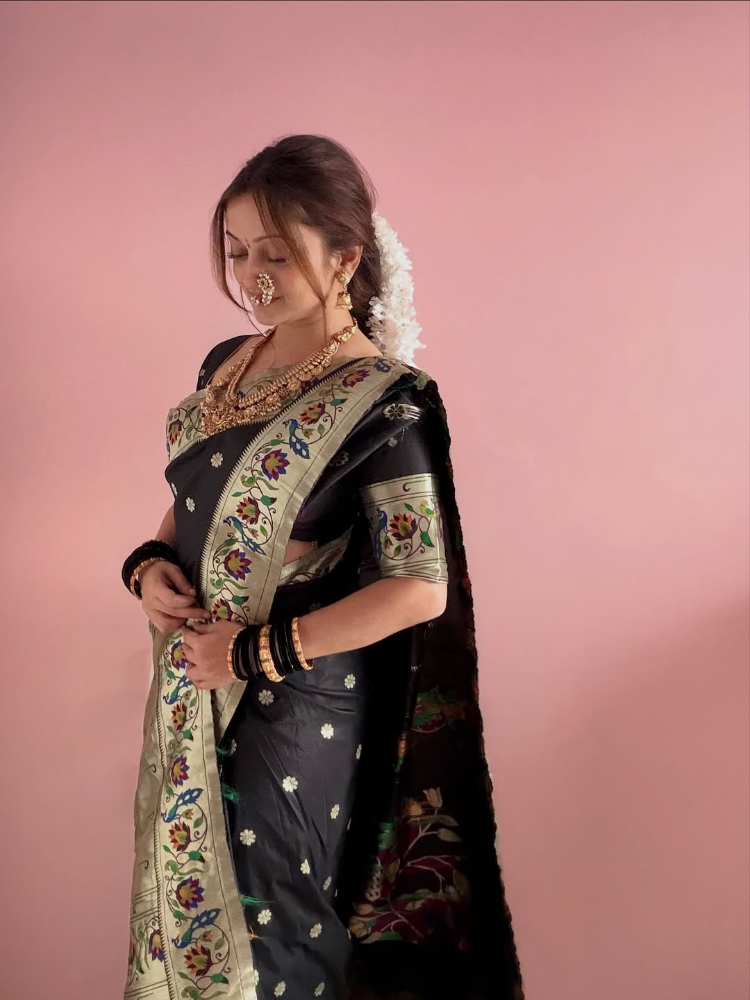 Mansi Naik black Paithani saree makar sankranti look