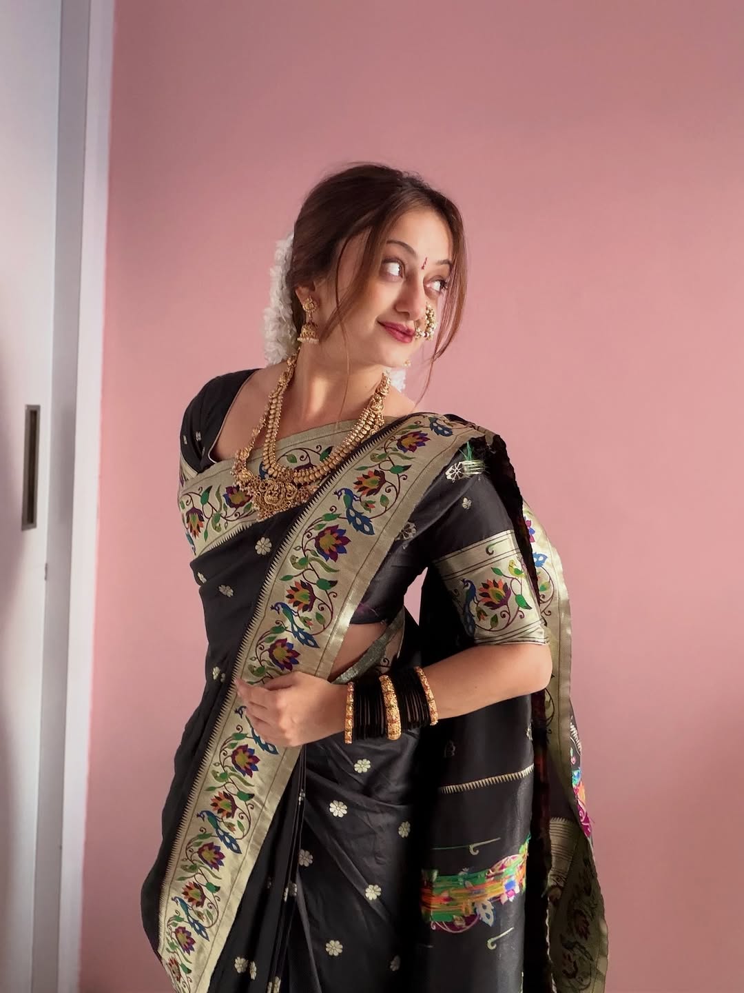 Mansi Naik black Paithani saree makar sankranti look