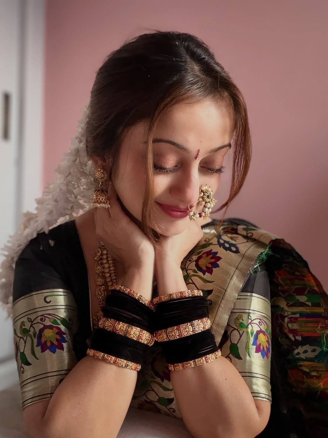 Mansi Naik black Paithani saree makar sankranti look