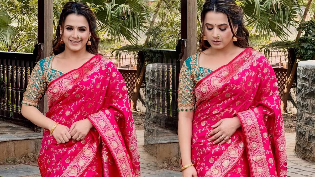 Prajakta Gaikwad in pink Banarasi saree with traditional jewelry.