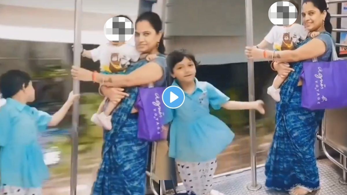 Risking lives for a reel: Woman stands at moving local train door with a child