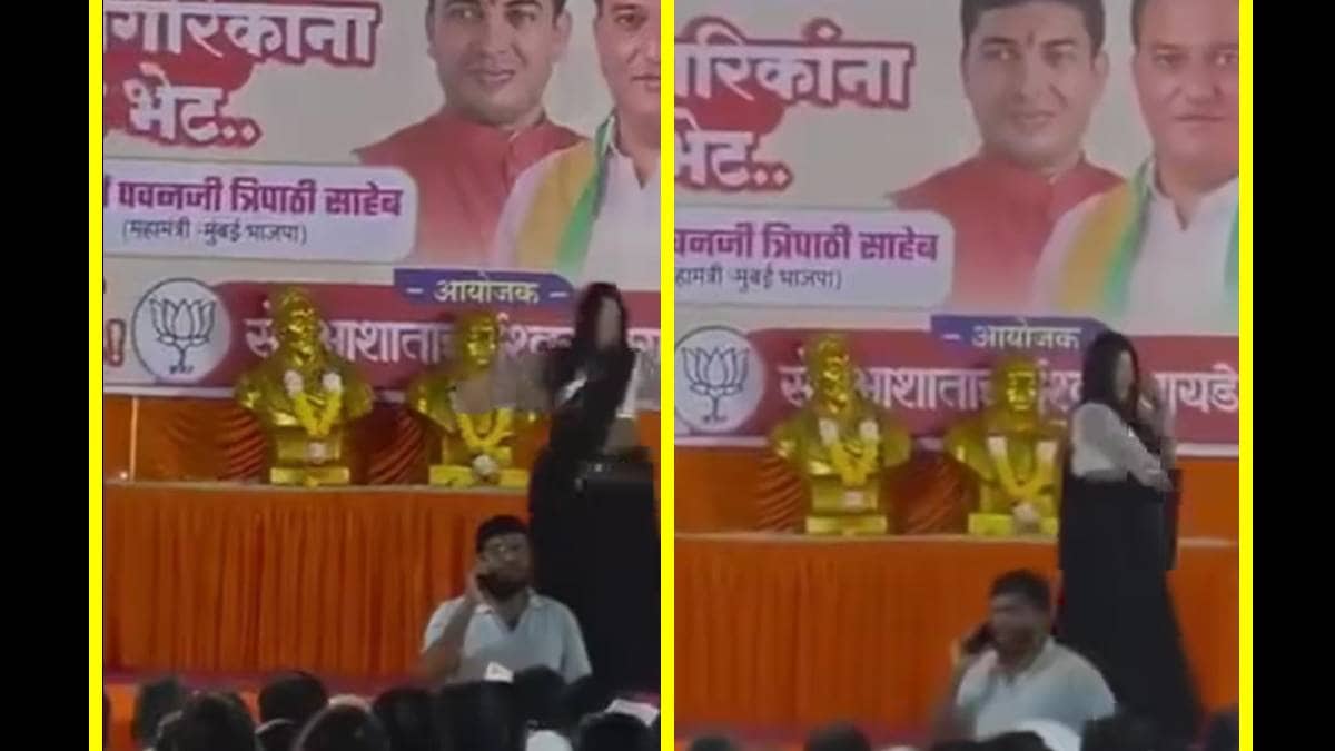 woman dances in front of the statues of Chhatrapati Shivaji Maharaj and Babasaheb Ambedkar at a BJP campaign rally in chandivali