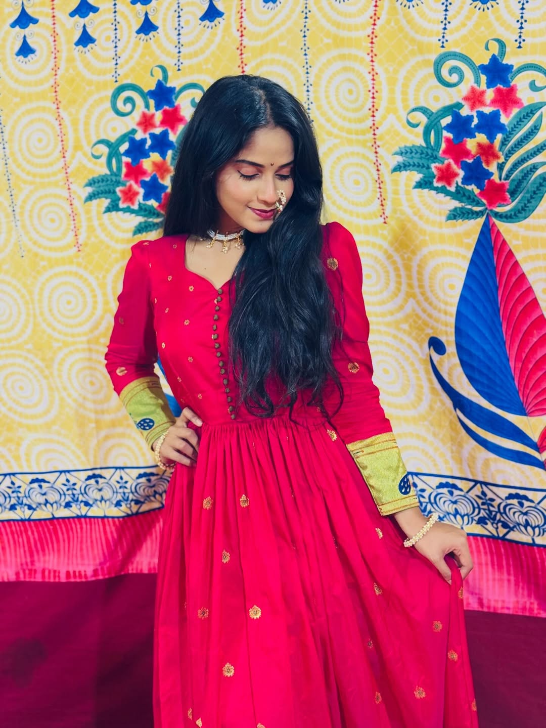 Prapti Redkar shines in a red saree-stitched dress with nath photos