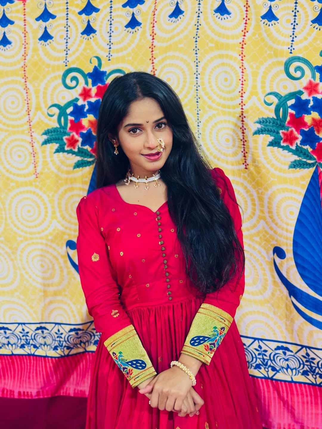 Prapti Redkar shines in a red saree-stitched dress with nath photos