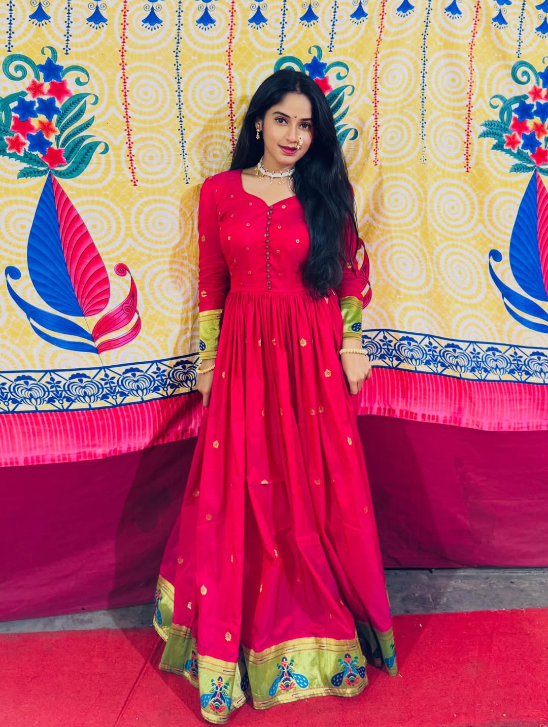 Prapti Redkar shines in a red saree-stitched dress with nath photos