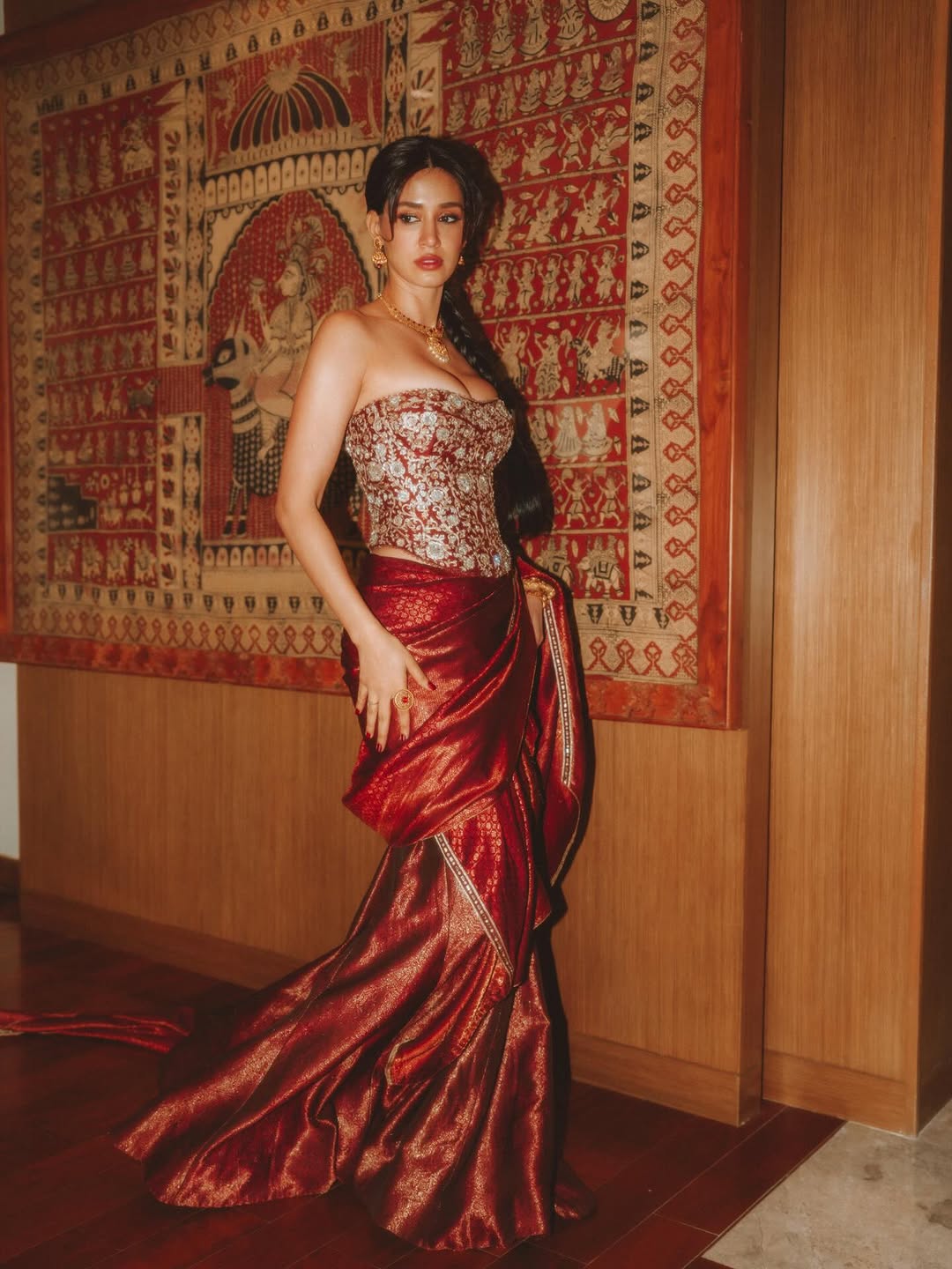 Disha Patani stuns in red saree at recent event