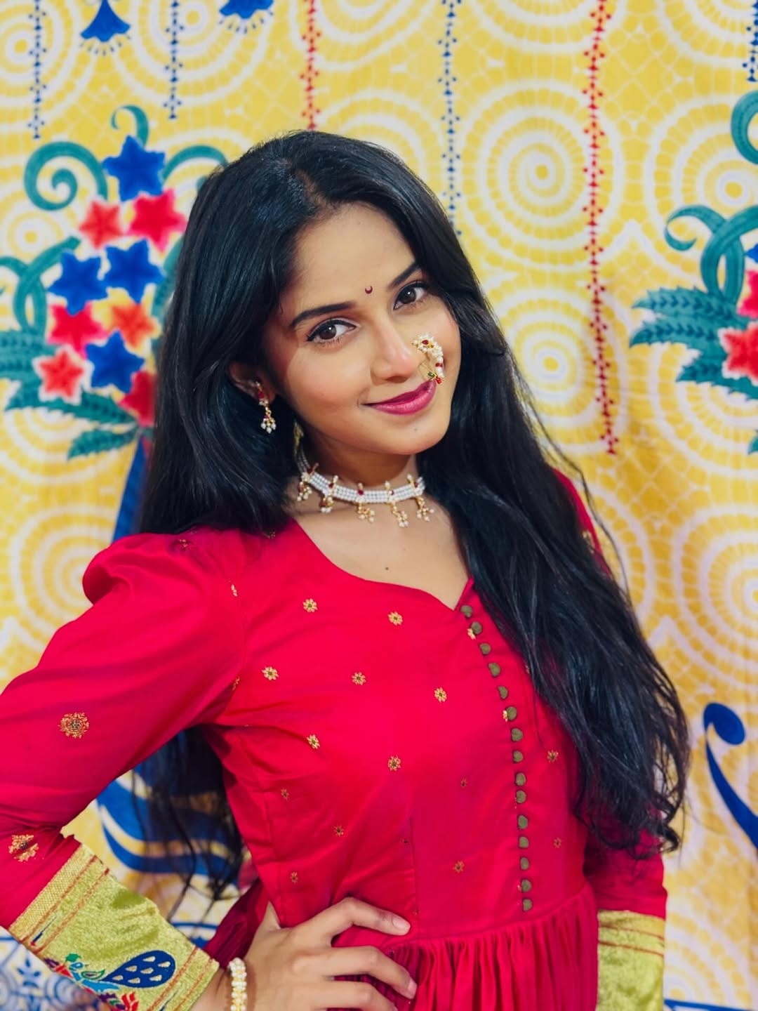Prapti Redkar shines in a red saree-stitched dress with nath photos