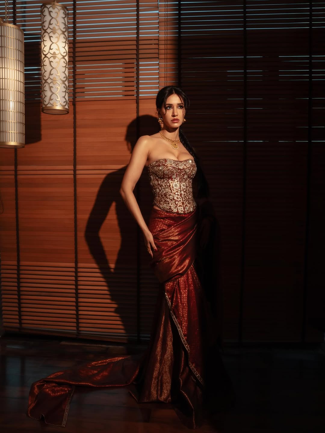 Disha Patani stuns in red saree at recent event