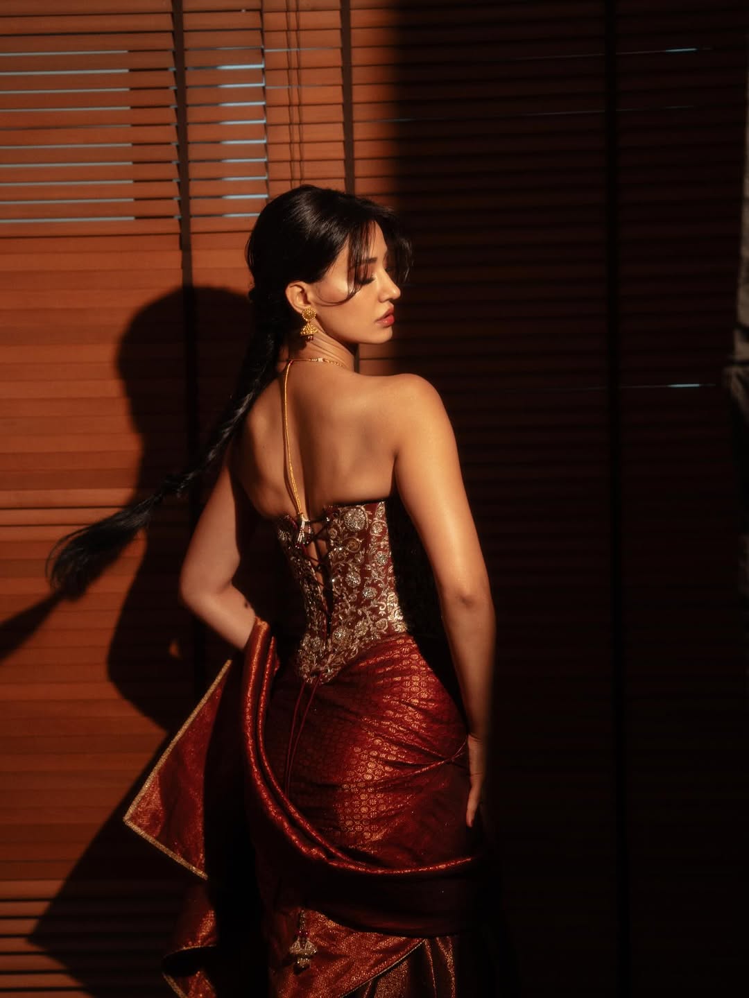 Disha Patani stuns in red saree at recent event