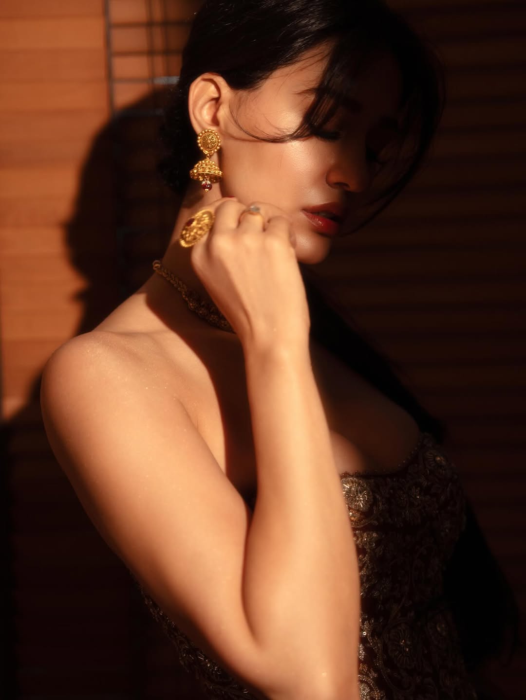 Disha Patani stuns in red saree at recent event