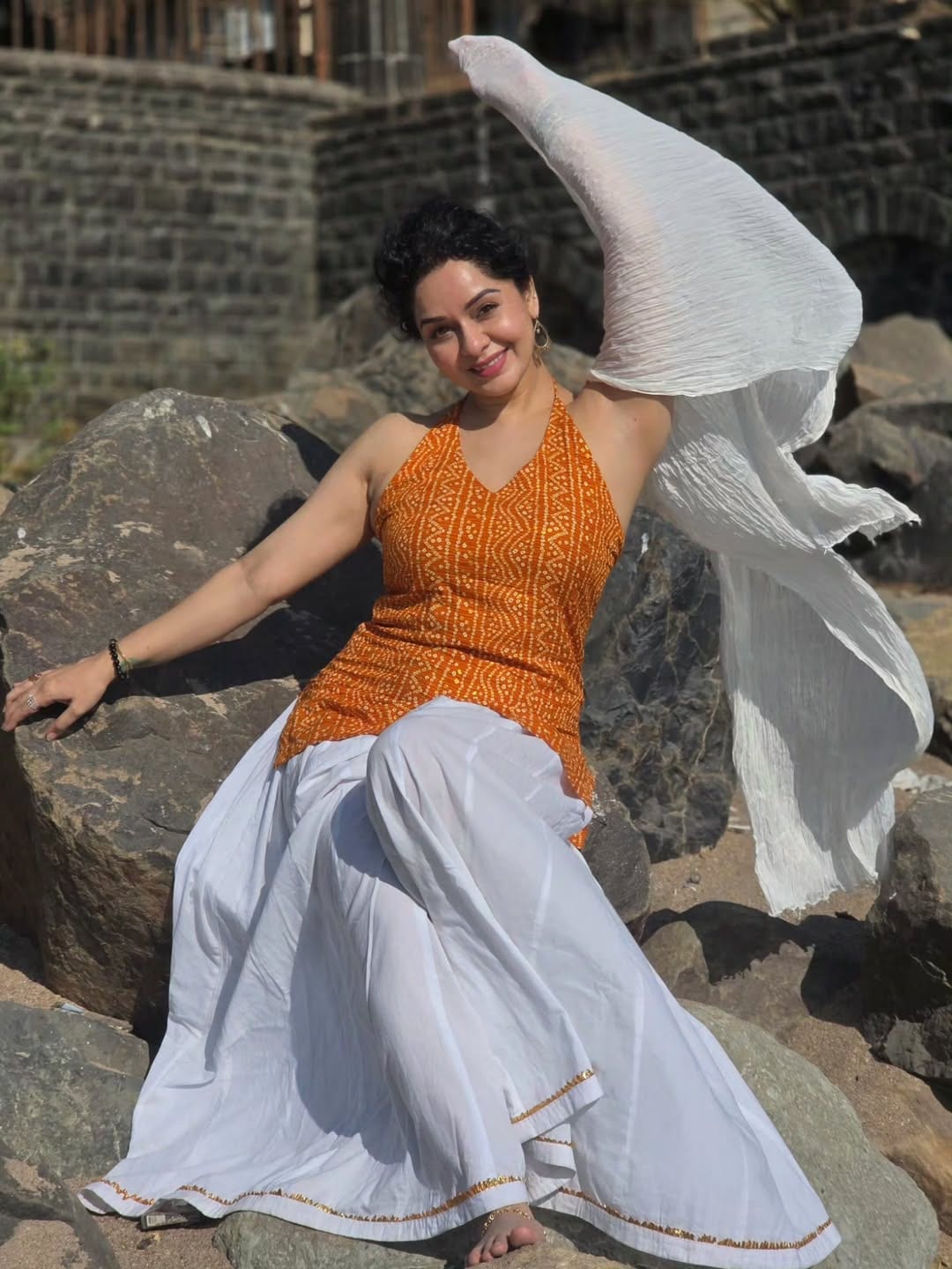 Sukhada Khandkekar glamorous beach photoshoot bandhani halter neck top look