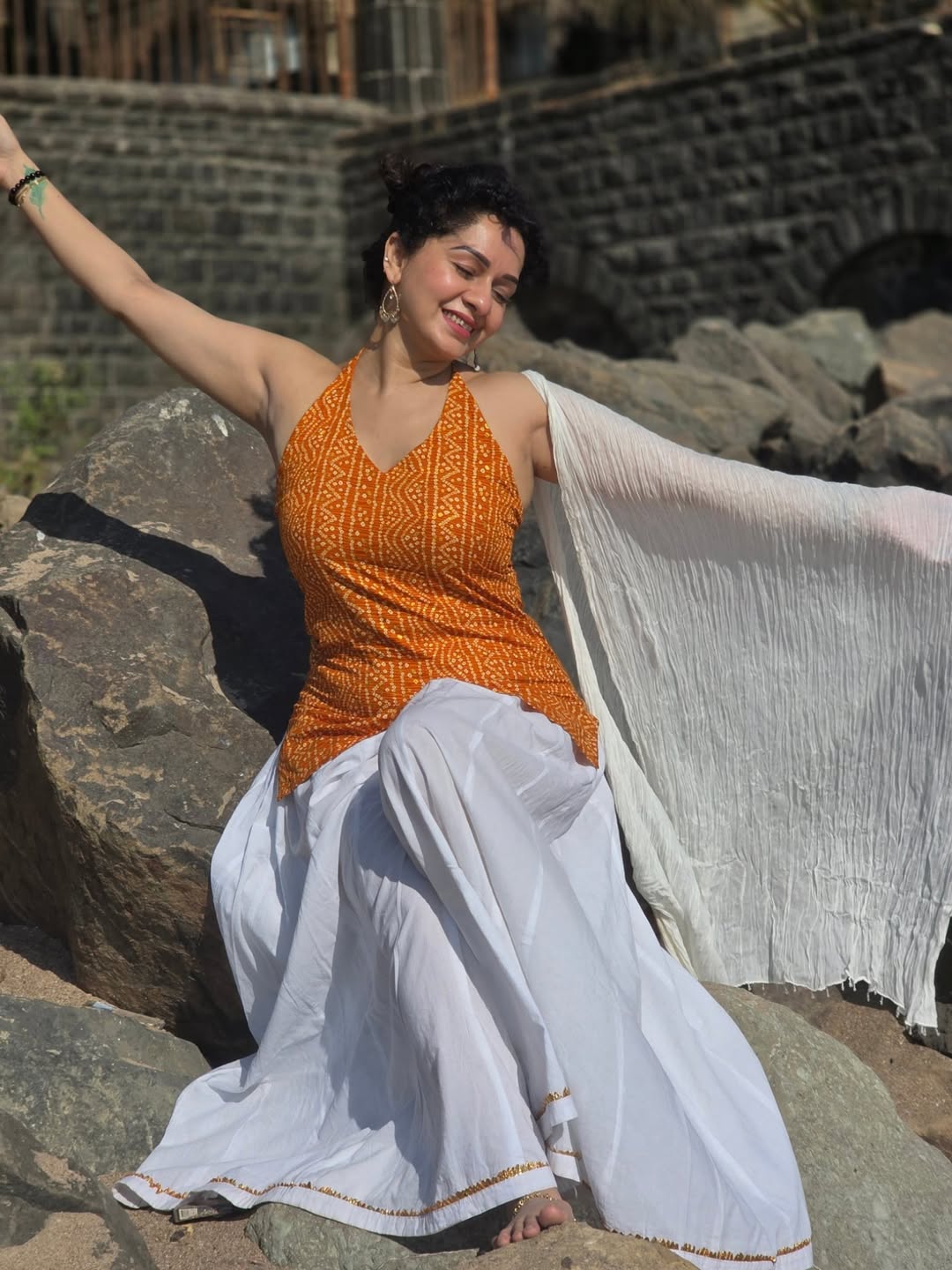 Sukhada Khandkekar glamorous beach photoshoot bandhani halter neck top look