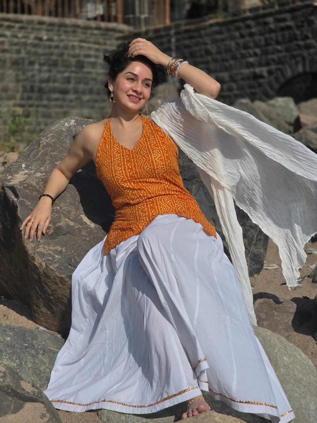 Sukhada Khandkekar glamorous beach photoshoot bandhani halter neck top look