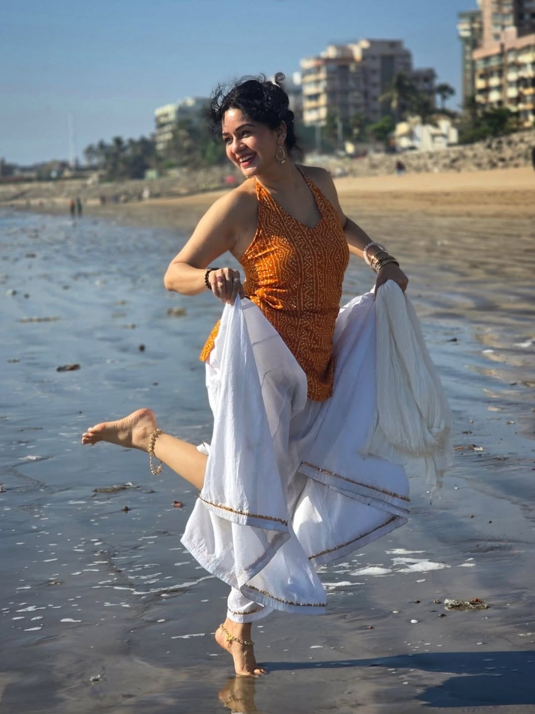 Sukhada Khandkekar glamorous beach photoshoot bandhani halter neck top look