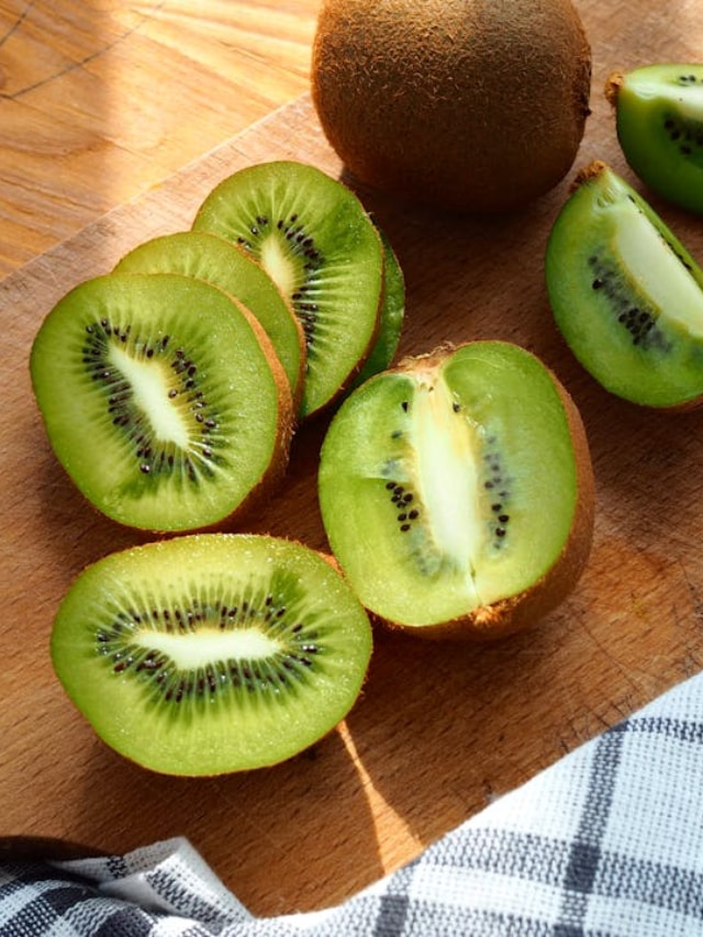 Eating Kiwi Fruit In Morning Breakfast