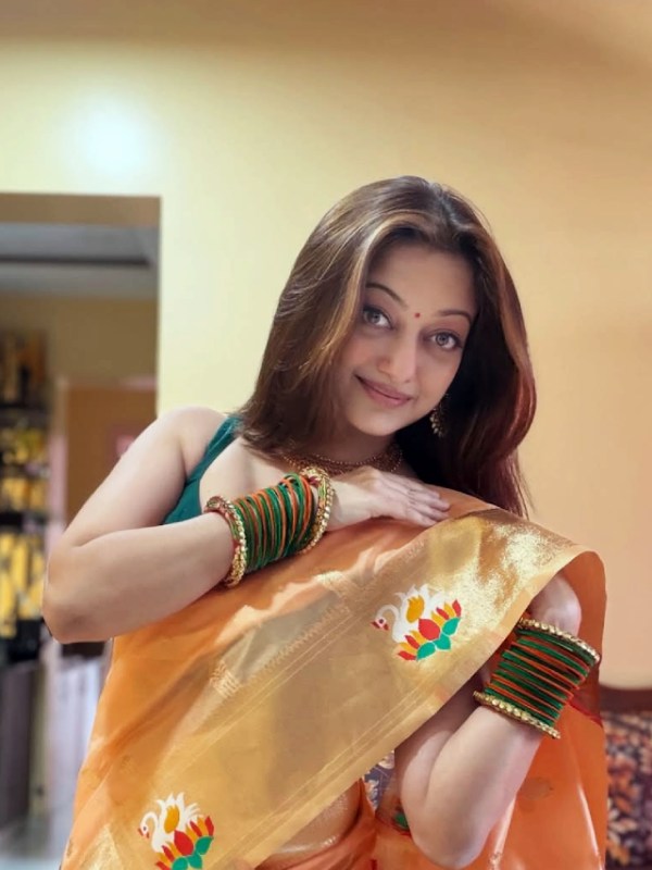 Manasi Naik Orange Saree Reel Video