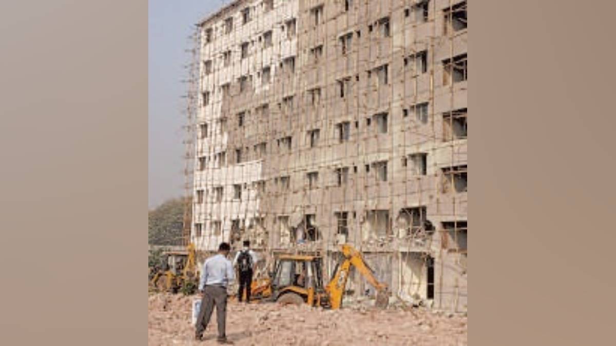 SRA action on unauthorized buildings Worli, Worli Pumping Station land encroachment row, BMC vs SRA unauthorized construction Mumbai, Demolition of 7-storey building in Worli SRA project, Action against SRA engineers RB Mitkar and DB Patil, Jijamata Nagar SRA project controversy,